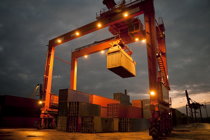 Cranes lifting containers