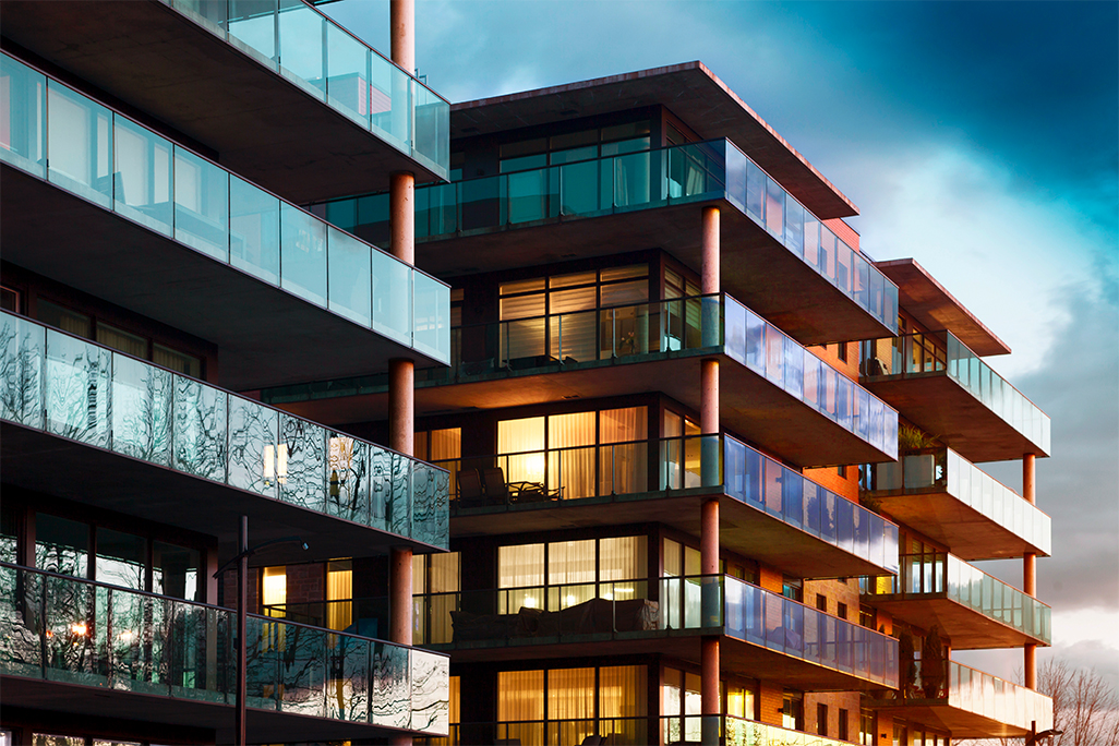 Three apartment buildings with balconies