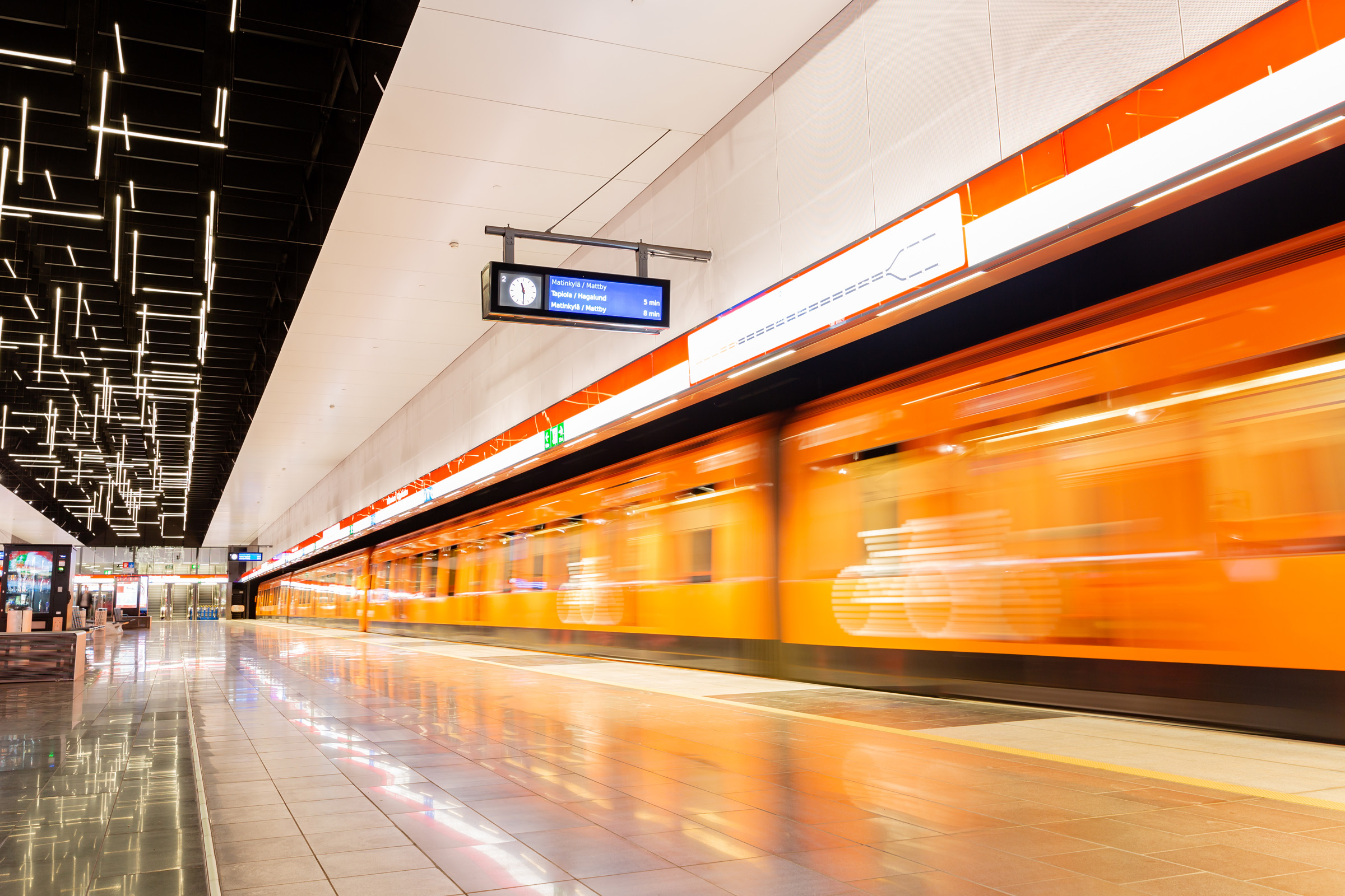 Close up of a passenger metro subway train coming into a station