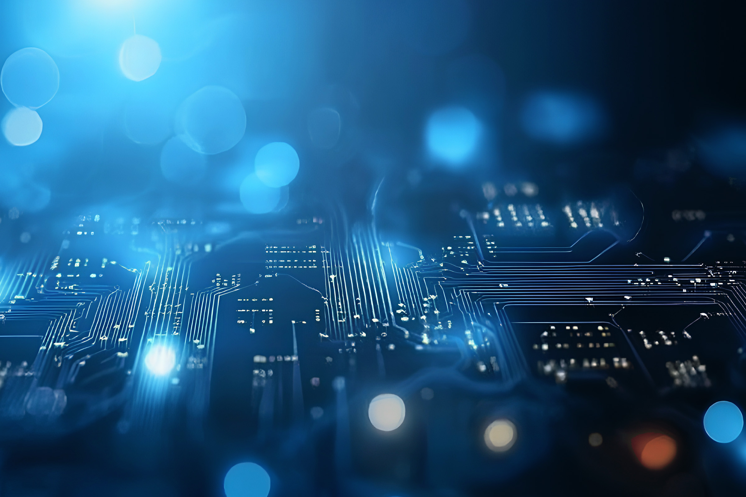 Circuitboard swathed in blue light